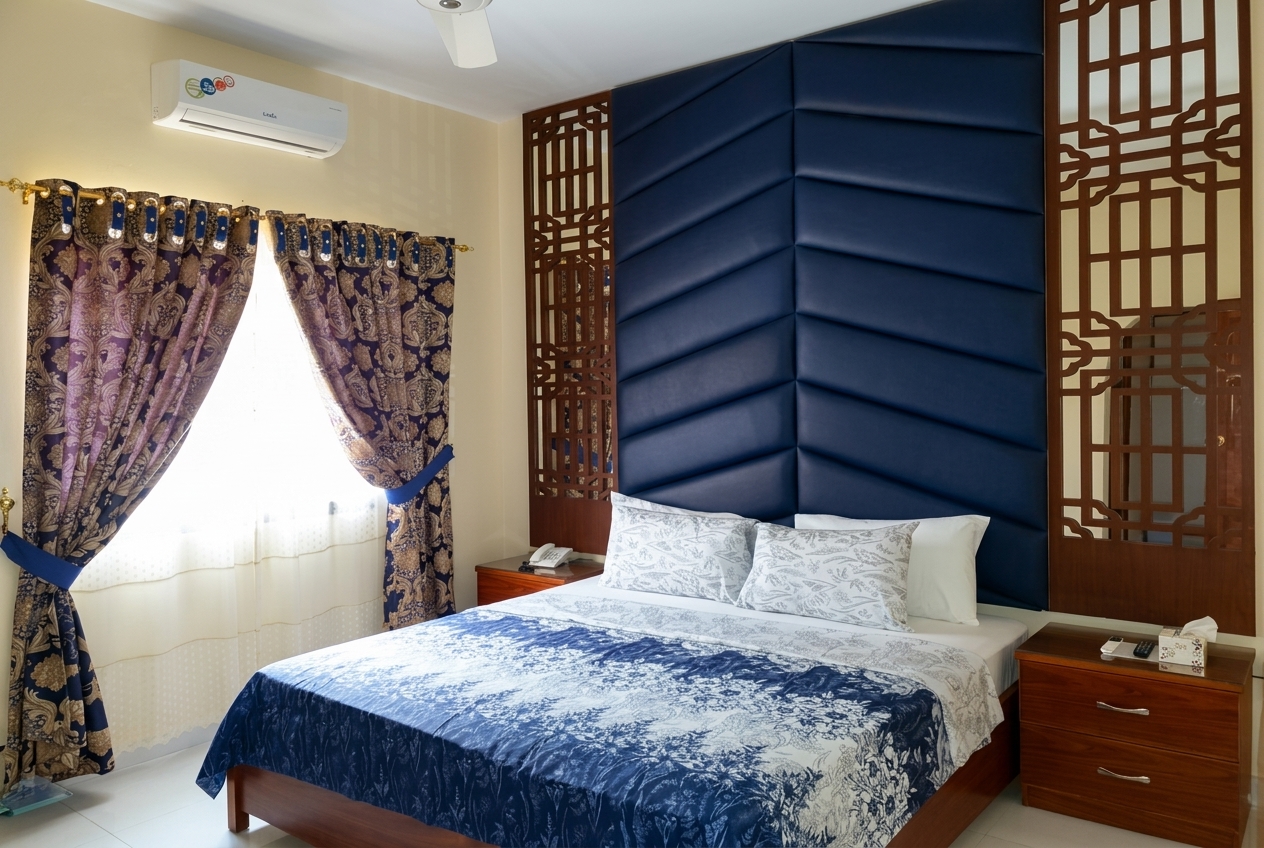 Room with red headboard